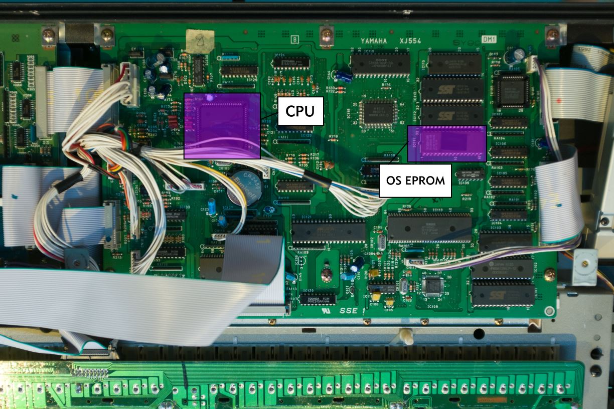 Closeup picture of the DM1 board, with IC111, the main OS EPROM chip, highlighted.