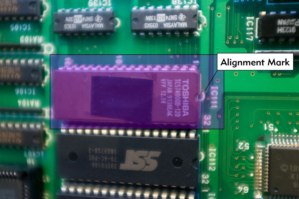 Closeup picture of IC111 on the DM1 board, highlighting the alignment markings.